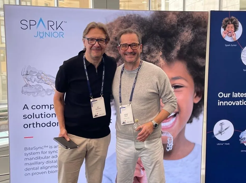Dr Iain Hoeltschi and Dr Joseph McGill at a Spark Junior stand